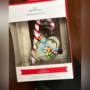 Hallmark Christmas Ornament Sloth figure wearing colorful sweater